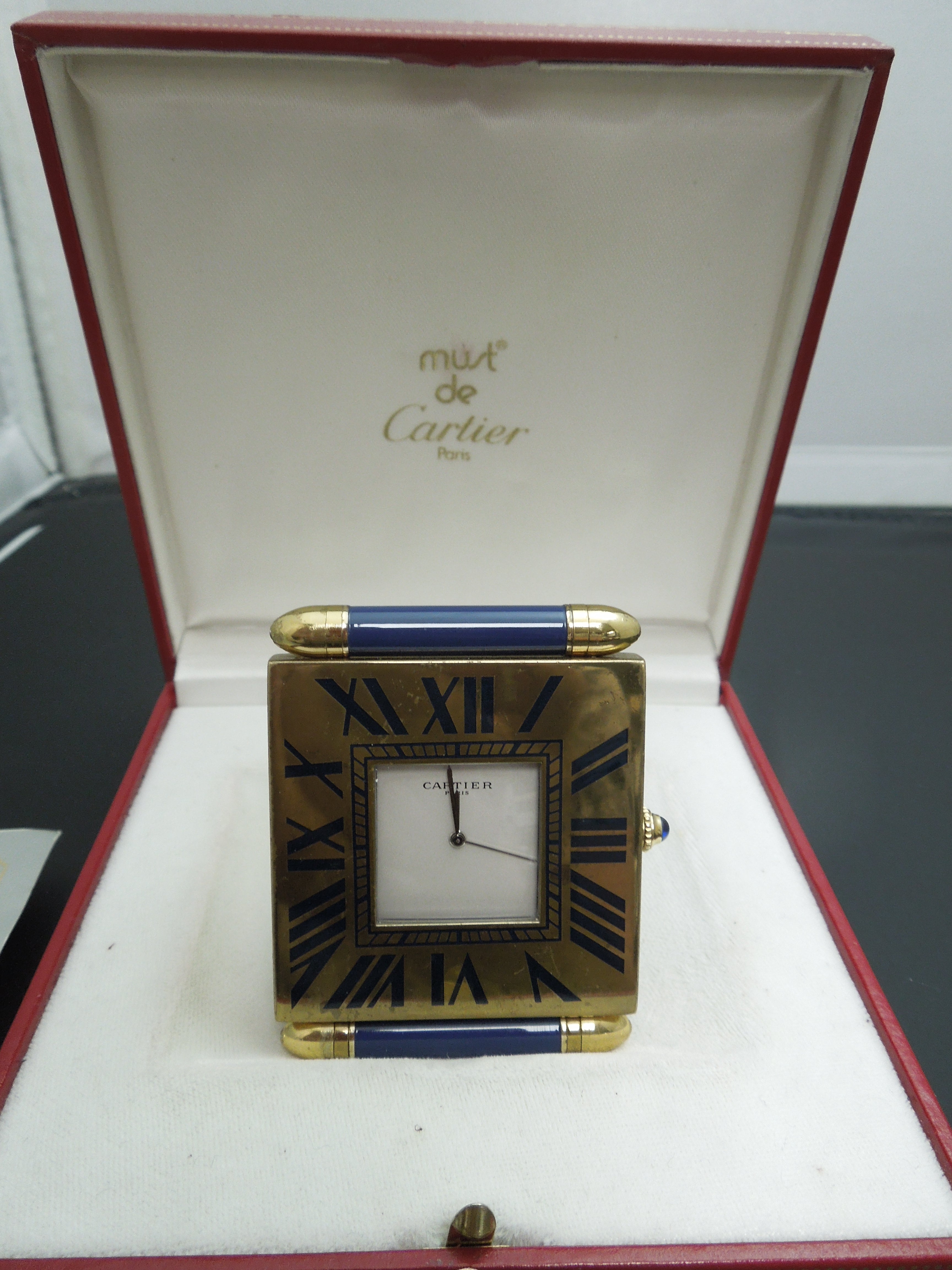 Cartier travel clock battery replacement hotsell