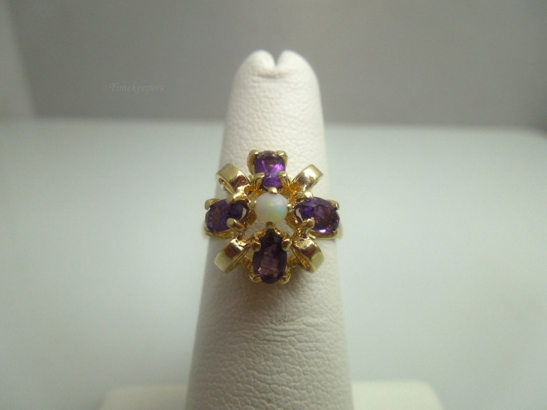 k609 Cute Ladies 14kt Yellow Gold Opal and Amethyst Bow Style Ring