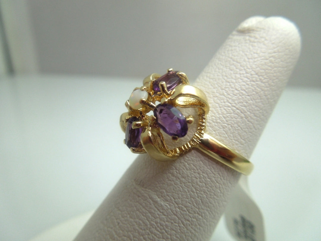 k609 Cute Ladies 14kt Yellow Gold Opal and Amethyst Bow Style Ring