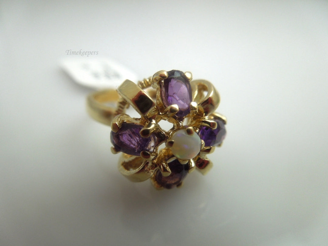 k609 Cute Ladies 14kt Yellow Gold Opal and Amethyst Bow Style Ring