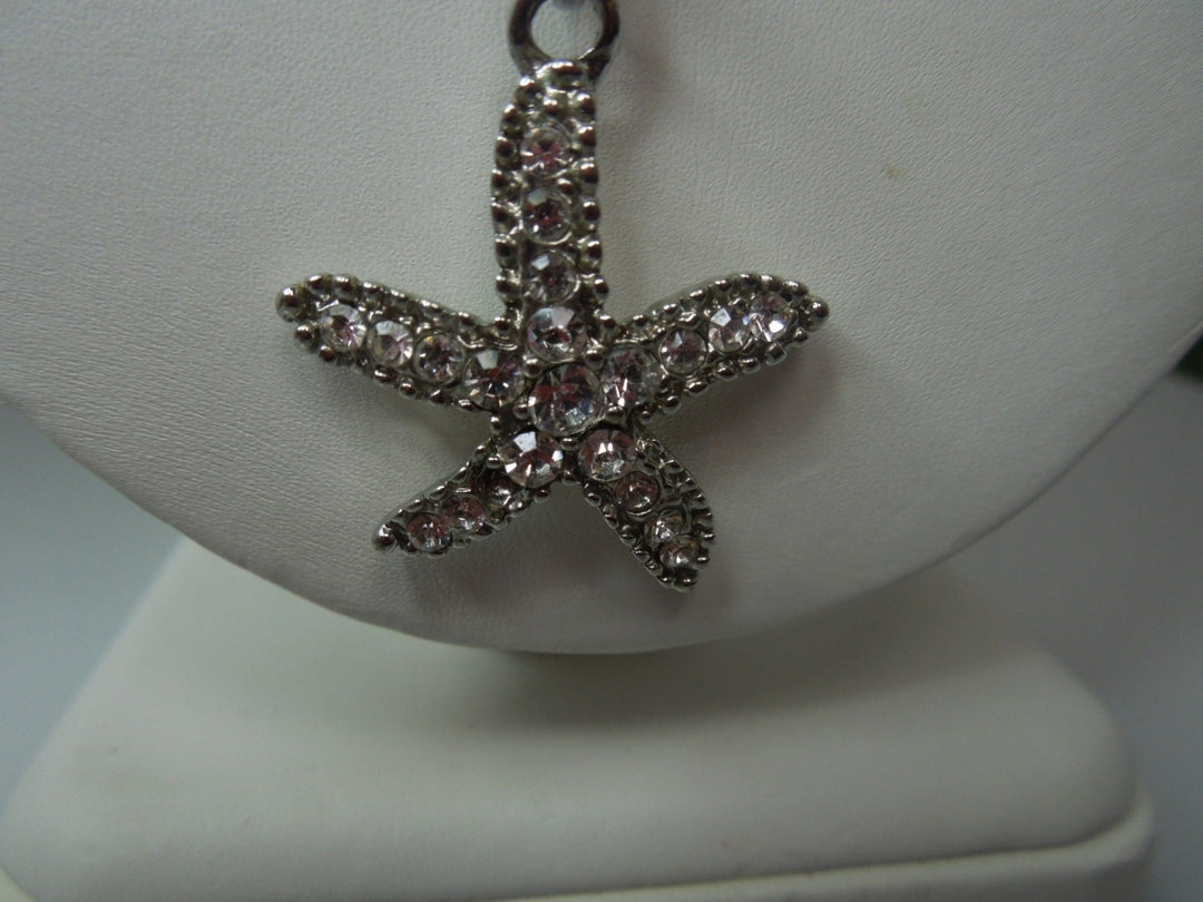 q384 Stunning Sterling Silver Chain and Star Fish Shaped Pendant