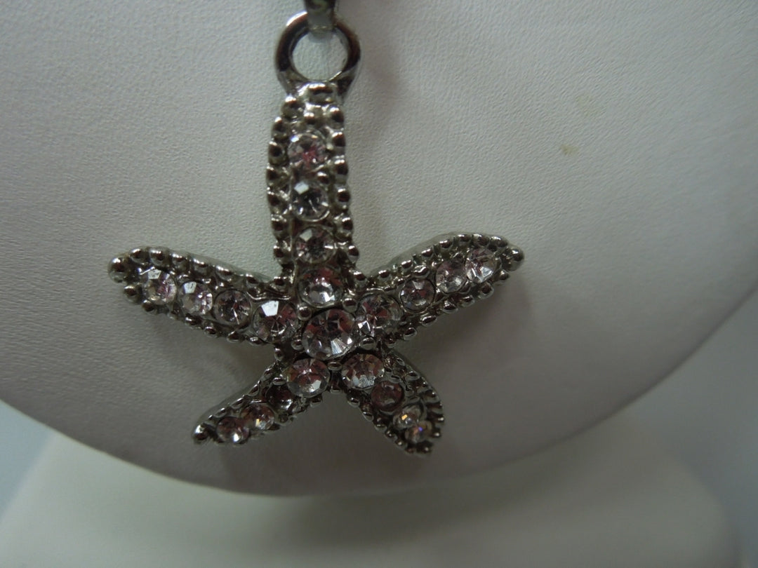 q384 Stunning Sterling Silver Chain and Star Fish Shaped Pendant