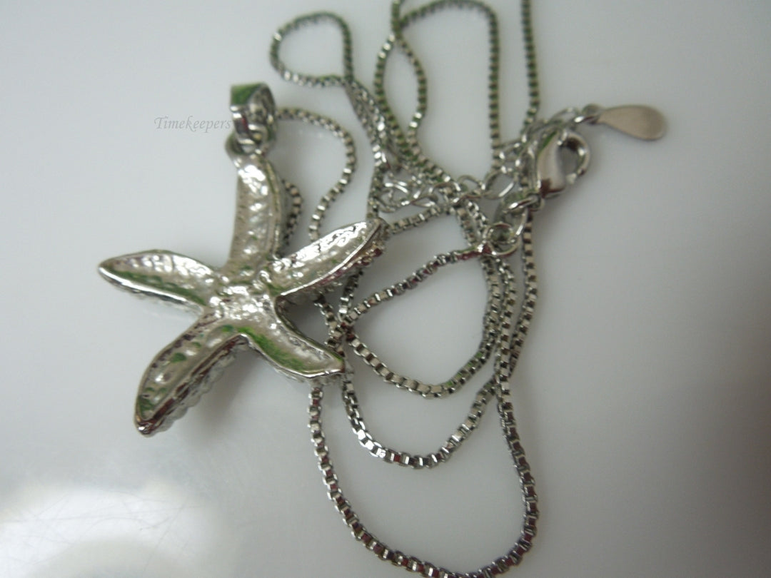 q384 Stunning Sterling Silver Chain and Star Fish Shaped Pendant