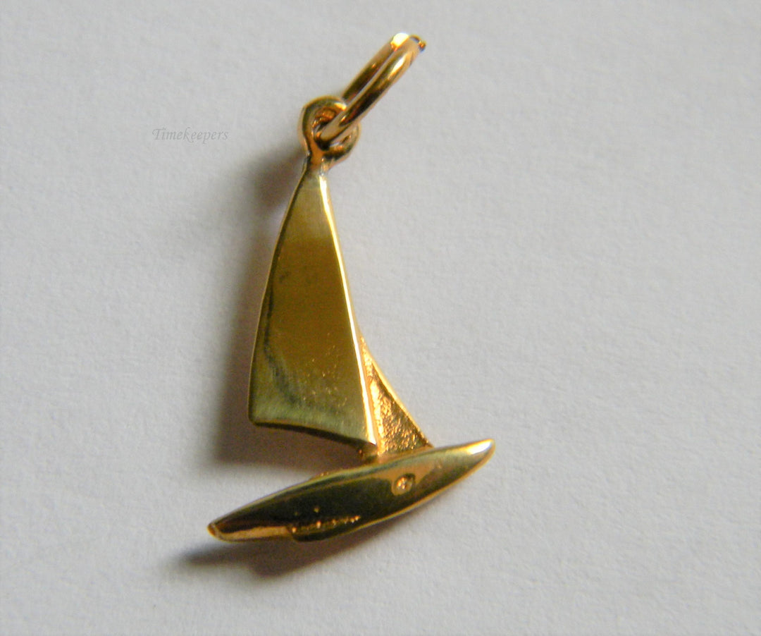 h812 Cute Sterling Silver Sail Boat Charm or Pendant with Gold Plating