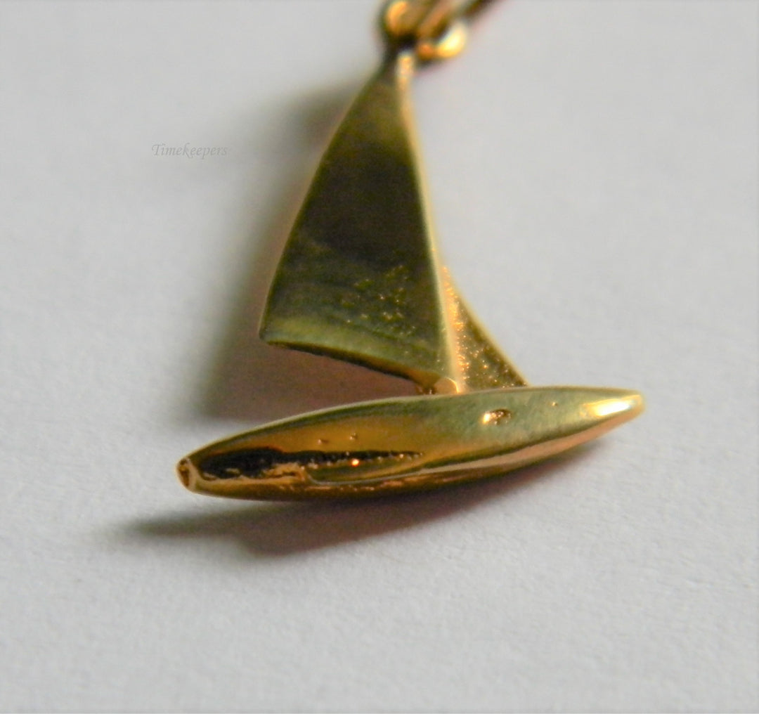 h812 Cute Sterling Silver Sail Boat Charm or Pendant with Gold Plating