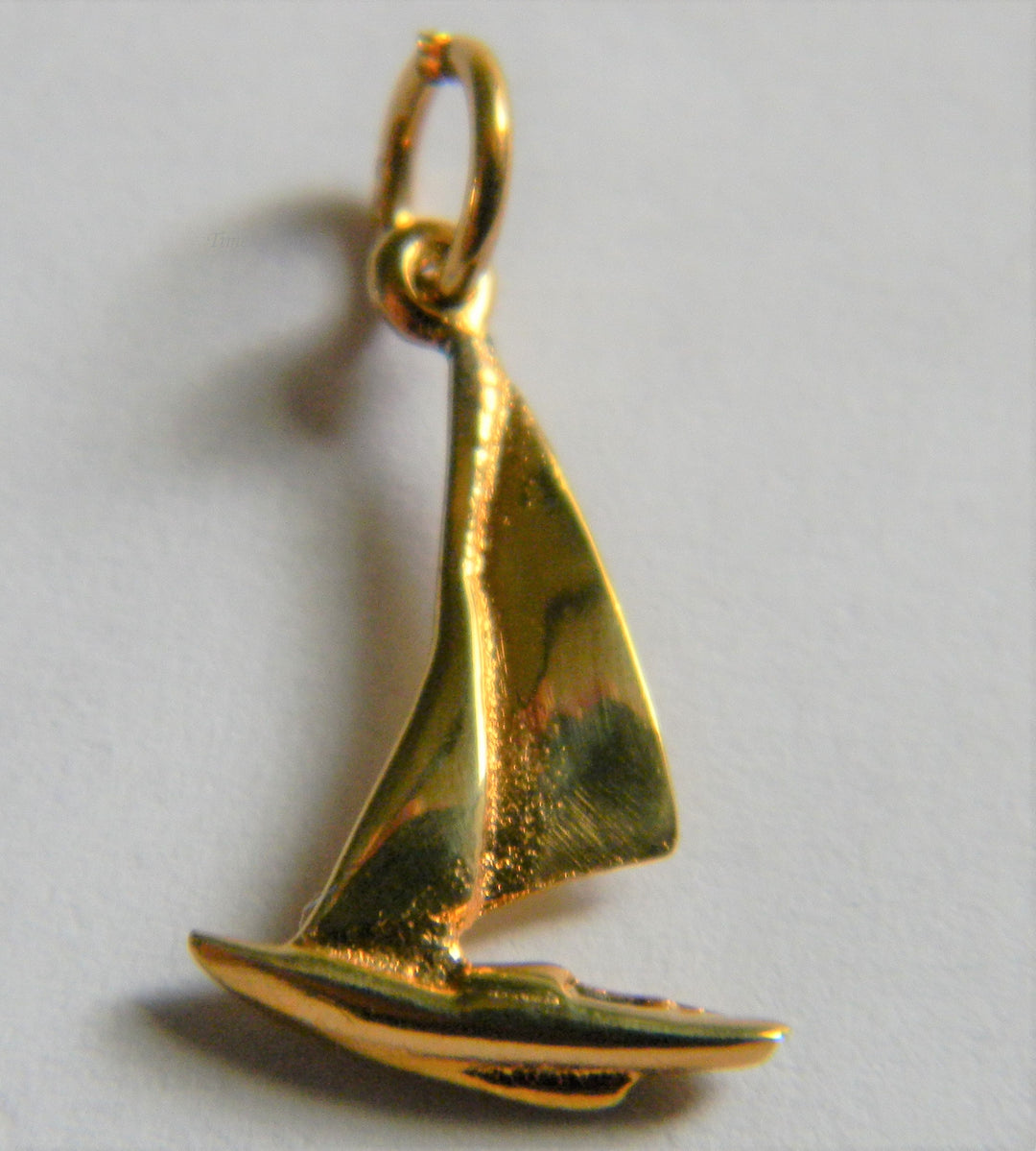 h812 Cute Sterling Silver Sail Boat Charm or Pendant with Gold Plating