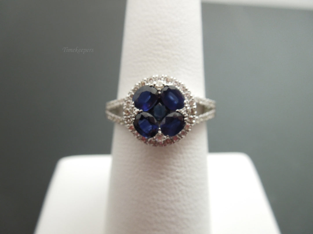 B935 Pretty 14kt White Gold Sapphire and Diamond Halo Style Ring