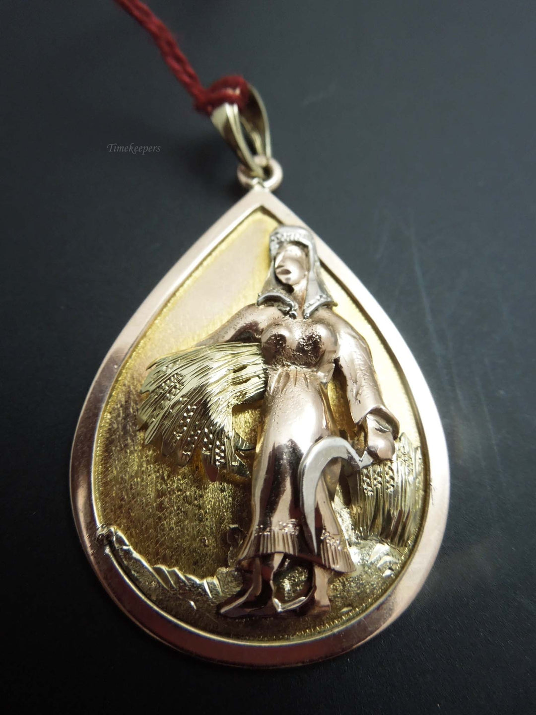 b942 Unique 14kt Tri-Colored Gold Woman with Sickle Pendant