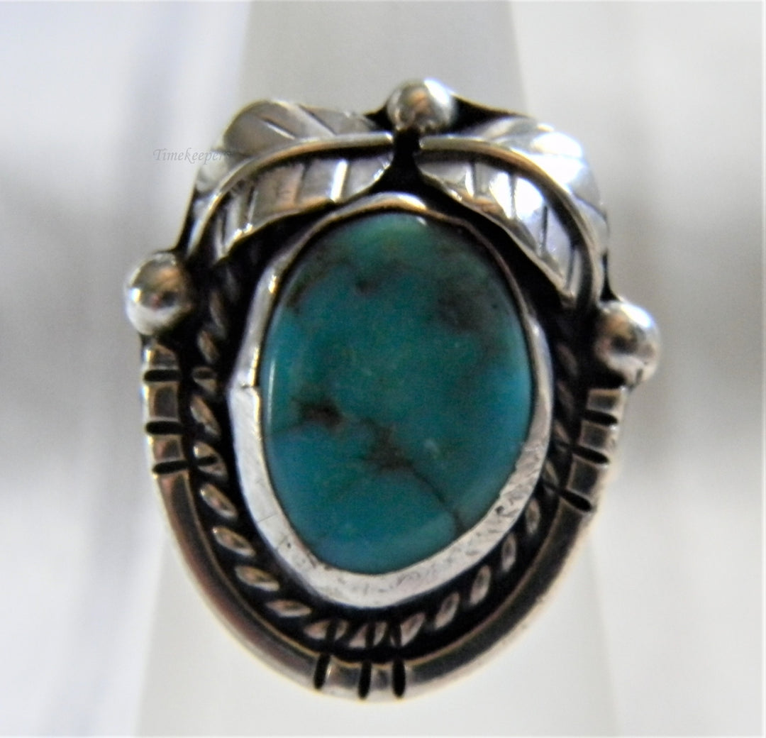 h948 Vintage Sterling Silver Ring with Cabochon set Turquoise in a Silver Frame