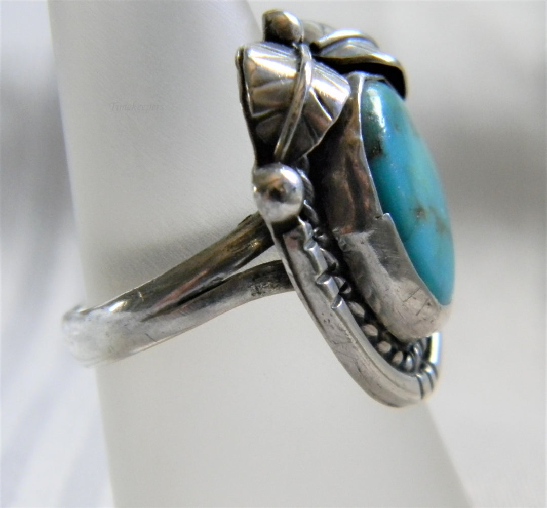 h948 Vintage Sterling Silver Ring with Cabochon set Turquoise in a Silver Frame