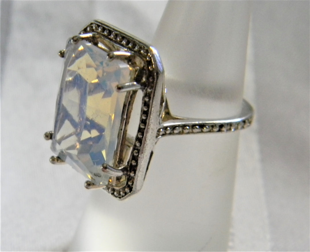 h955 Sterling Silver Ring with Iridescent Glass Stone in a Silver Frame