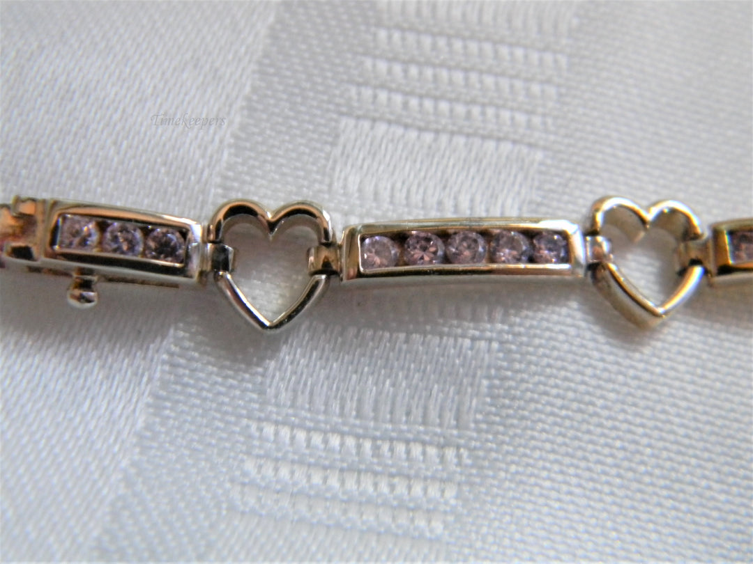 j715 Beautiful Vintage Sterling Silver Heart and Pink Stone Bracelet