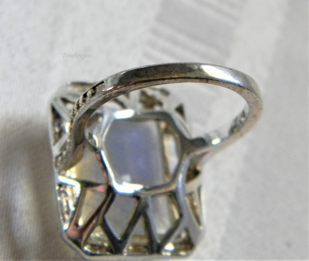 h955 Sterling Silver Ring with Iridescent Glass Stone in a Silver Frame