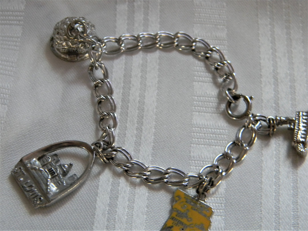 j717 Nice Silver Charm Double Link Bracelet with 4 St. Louis Charms