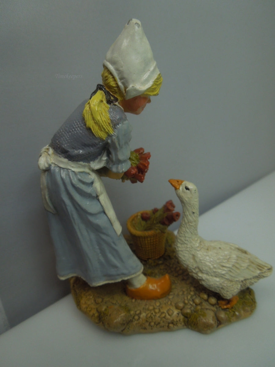 q739 Franklin Mint Children of the World "Netherlands" Fine Pewter Figurine Old Lady with Duck (1977)