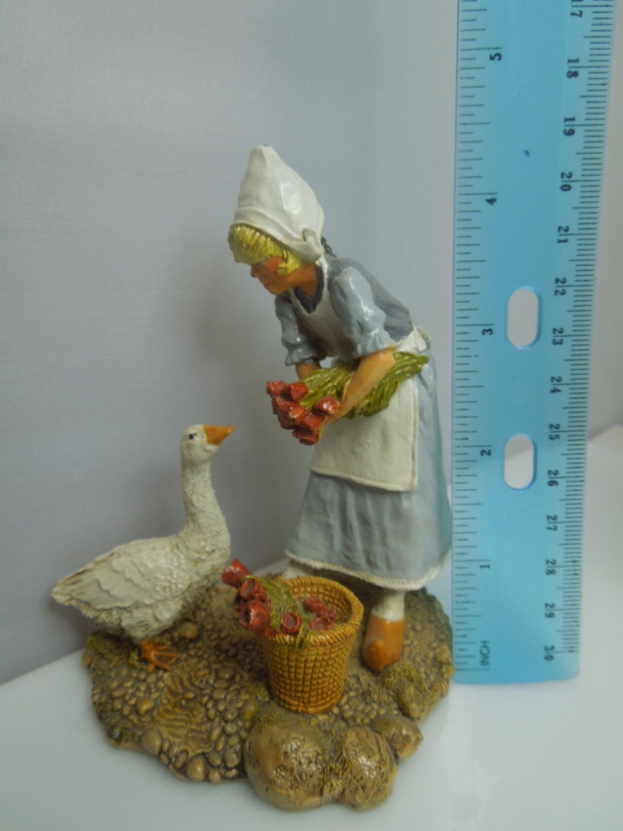 q739 Franklin Mint Children of the World "Netherlands" Fine Pewter Figurine Old Lady with Duck (1977)