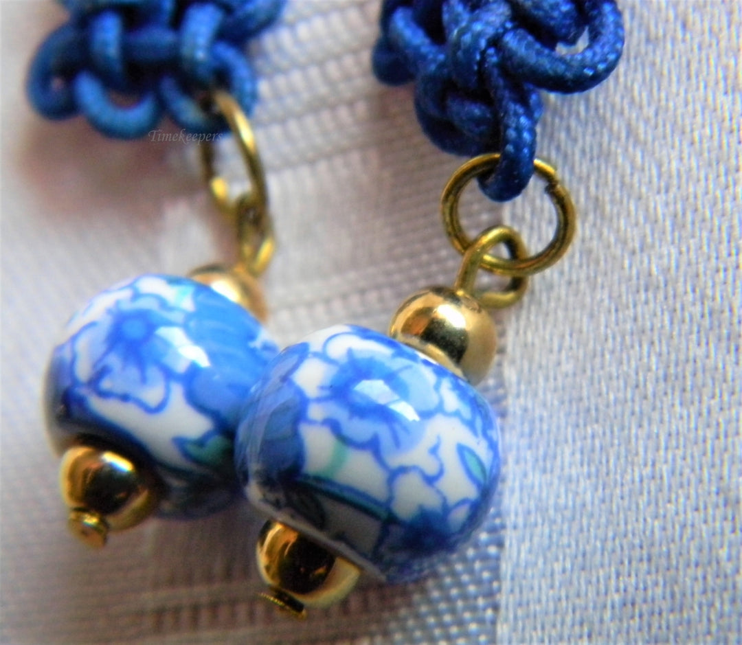 h994 Beautiful Gold Tone Dangle Earrings with Blue Knots and Ceramic Beads