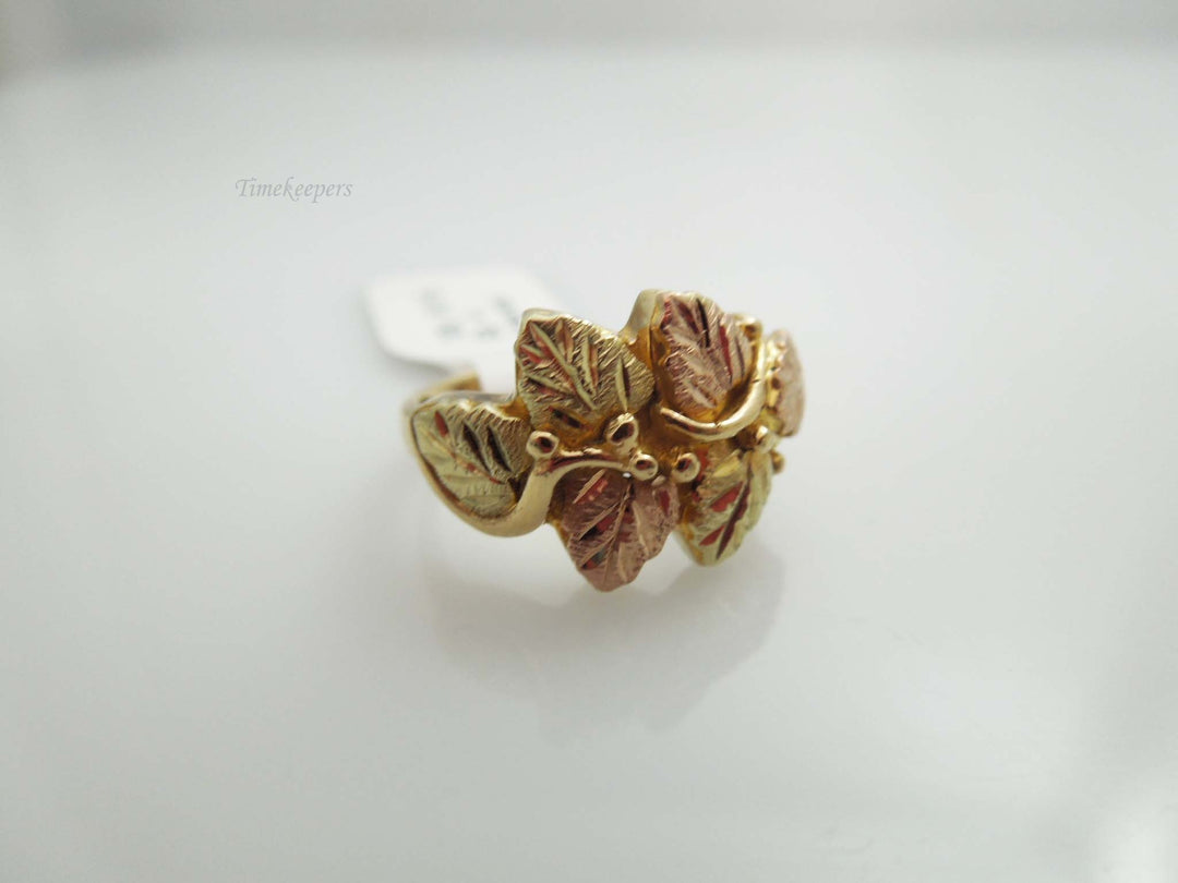 g720 Lovely Ladies 10kt Yellow and Rose Gold Diamond Cut Leaves Ring