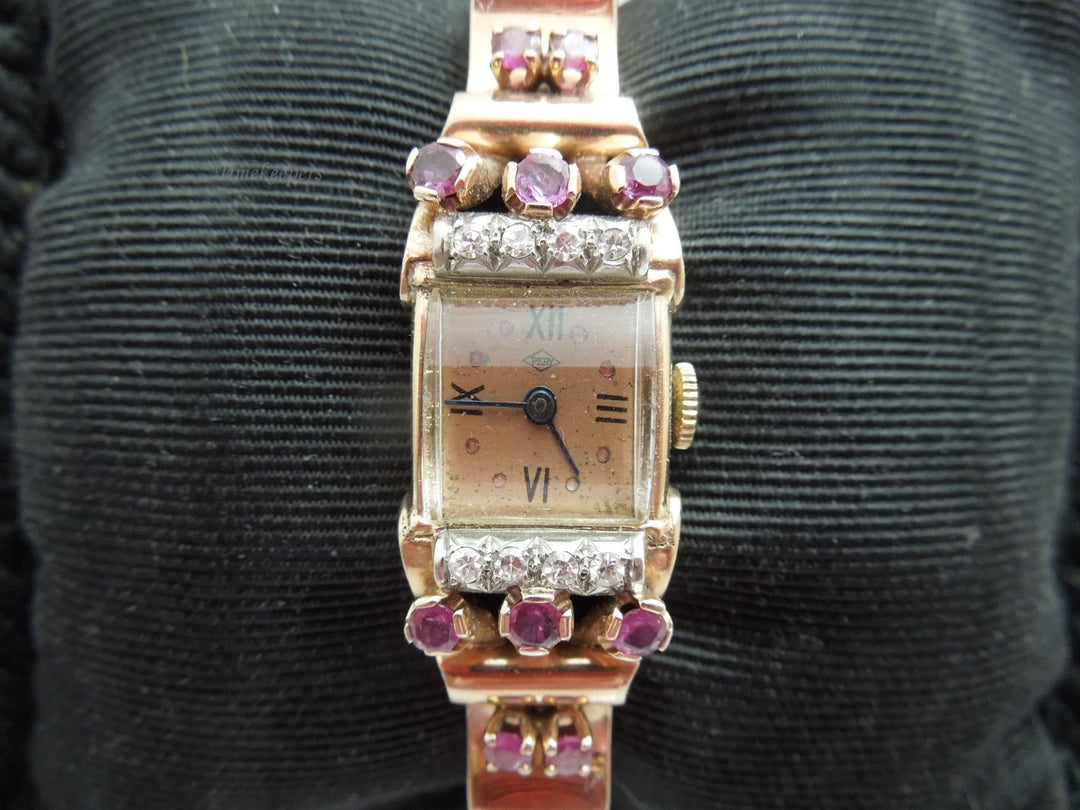 g787 Gorgeous Ladies Antique 14kt Rose Gold Diamond and Ruby Pery Wristwatch