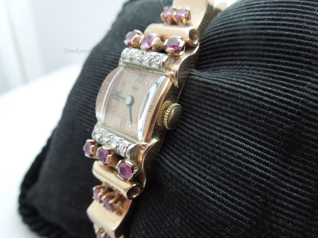 g787 Gorgeous Ladies Antique 14kt Rose Gold Diamond and Ruby Pery Wristwatch
