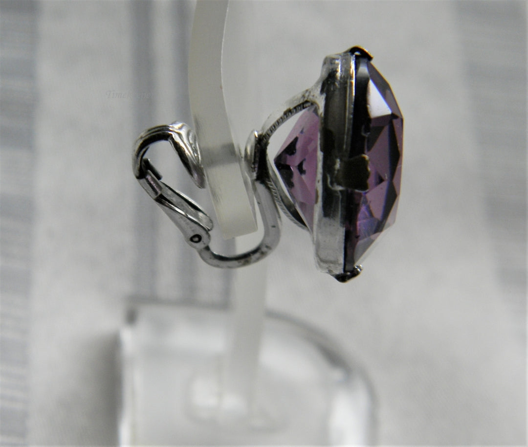 p107 Pretty Silver Tone Clip on Earrings with Faceted Purple Glass Stones