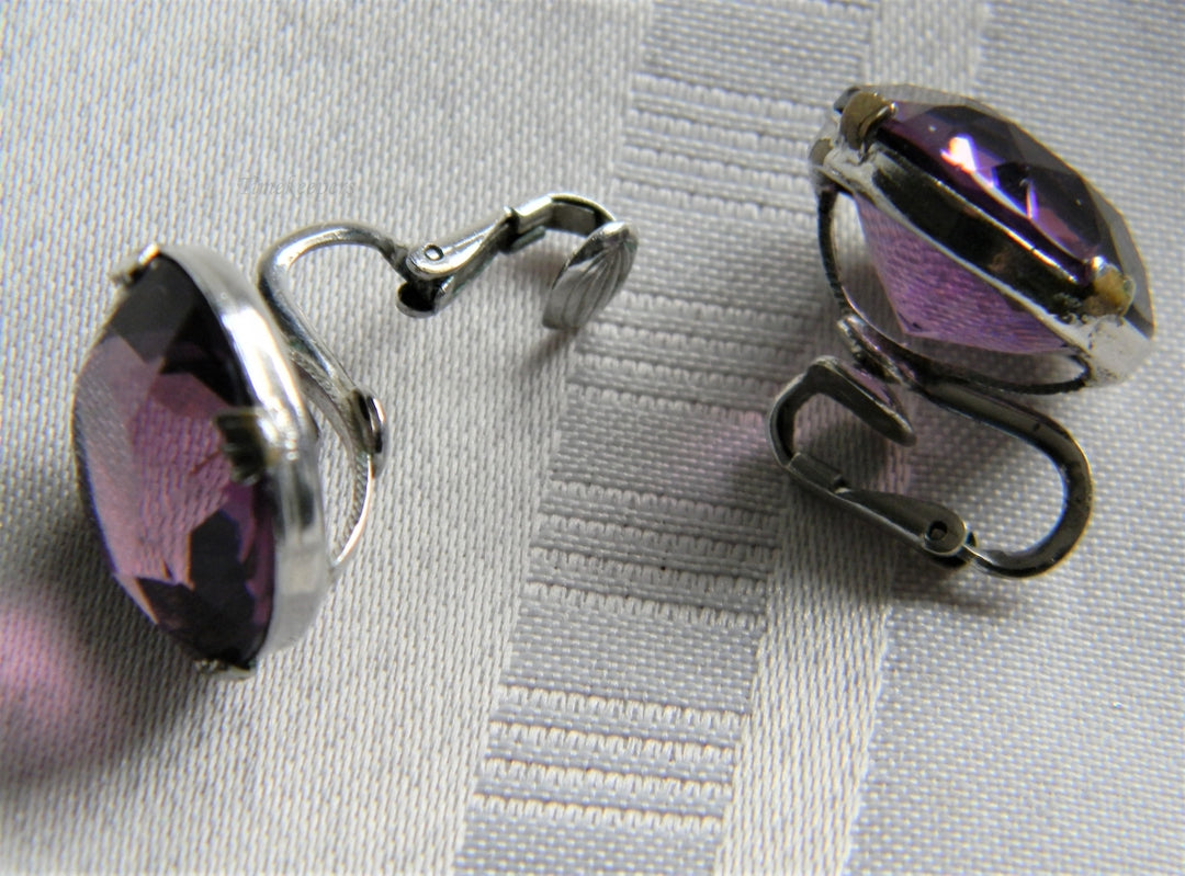 p107 Pretty Silver Tone Clip on Earrings with Faceted Purple Glass Stones