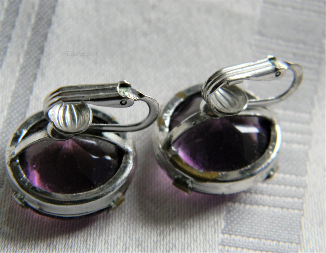 p107 Pretty Silver Tone Clip on Earrings with Faceted Purple Glass Stones