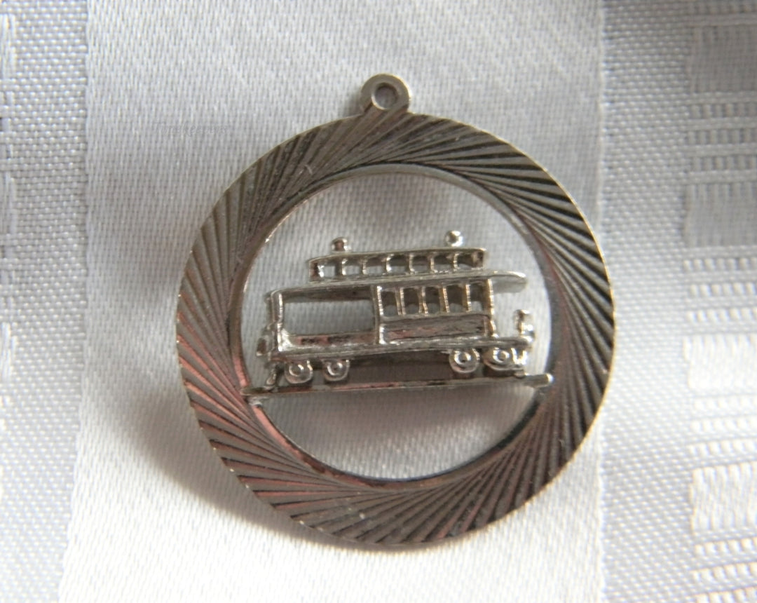 p138 Vintage Silver Tone Circle Pendant with Cable Car in Middle (No Chain)