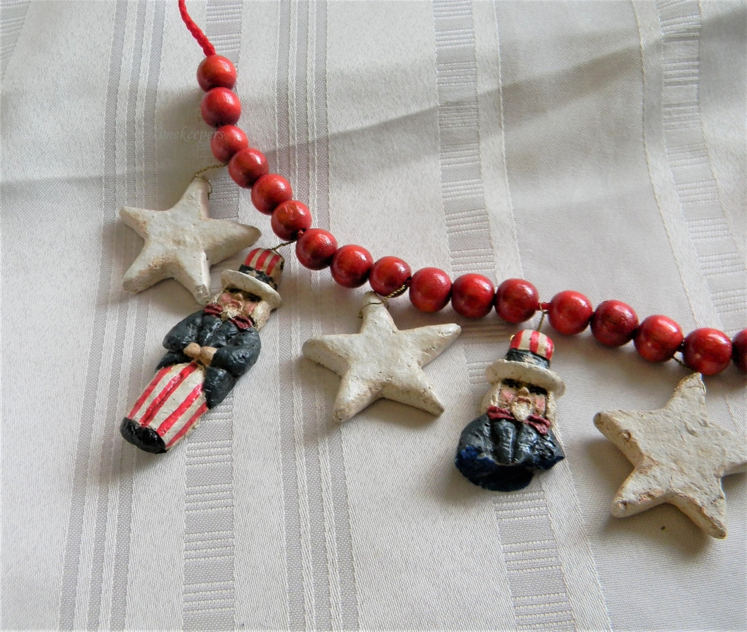 p154 Unique Paper Mache Uncle Sam Figures and Wood Beads on Red Cord