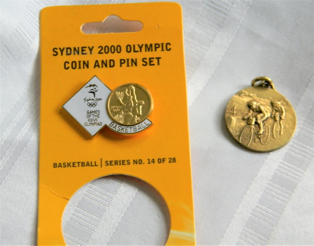 p219 Lot of 2 Collectible 2000 Olympic Lapel Pin and Cyclist Pendant/ Medal