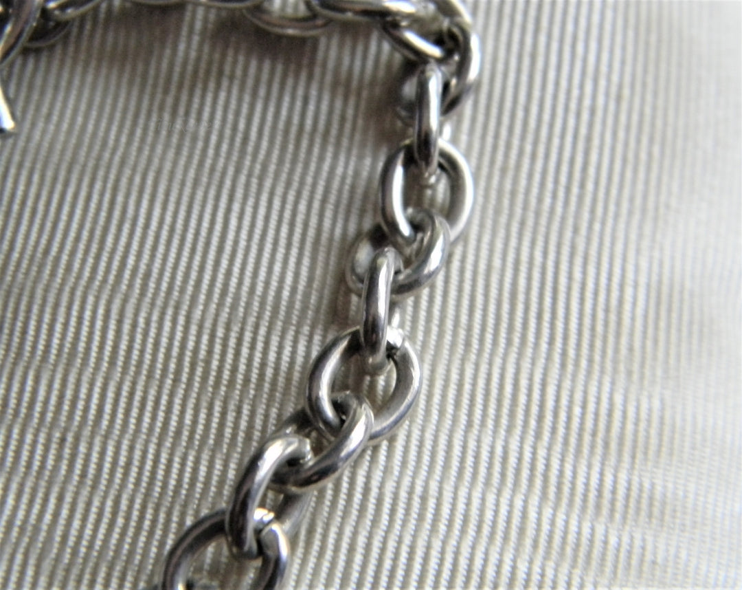 p242 Nice Silver Tone Charm Bracelet with Heart Charm and Toggle Clasp