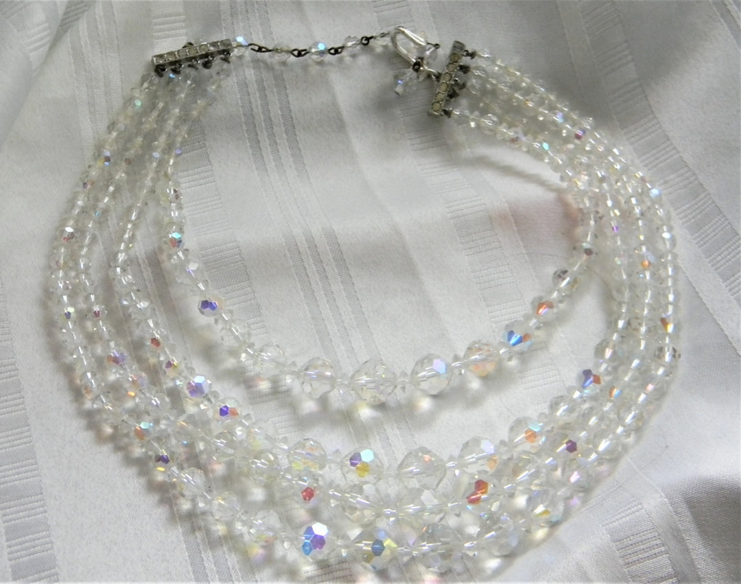 p259 Beautiful Borealis Three Strand Beaded Necklace with Silver Tone Clasp