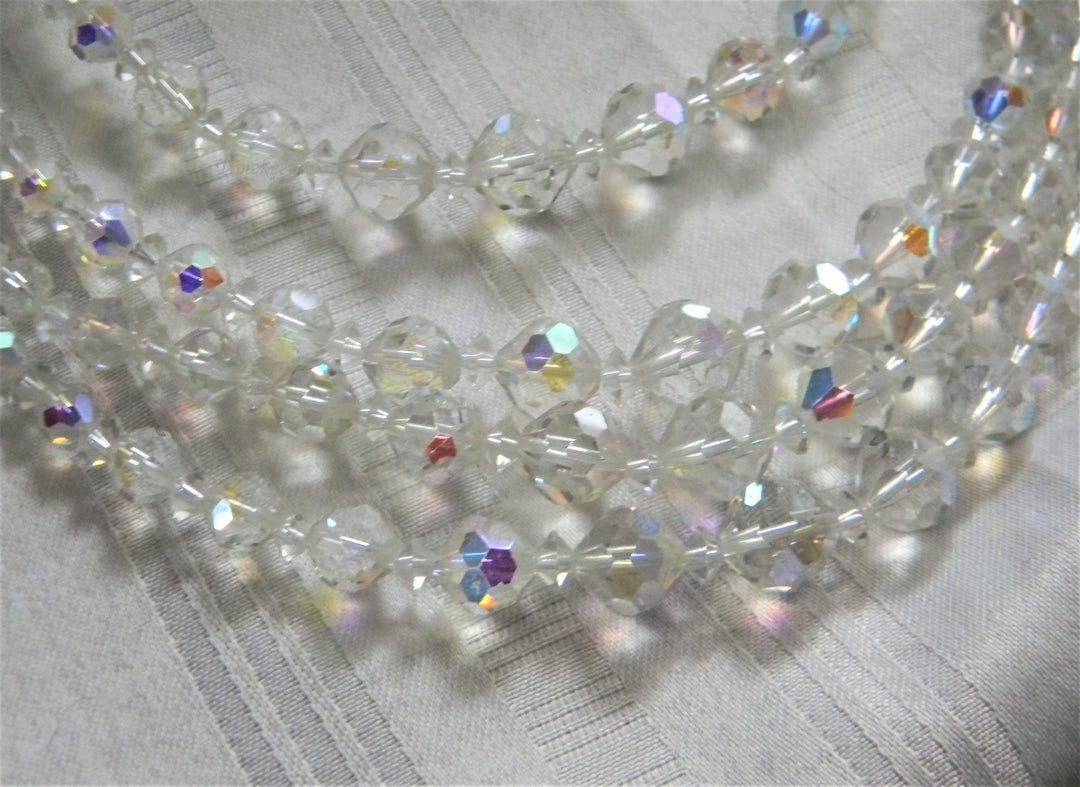 p259 Beautiful Borealis Three Strand Beaded Necklace with Silver Tone Clasp