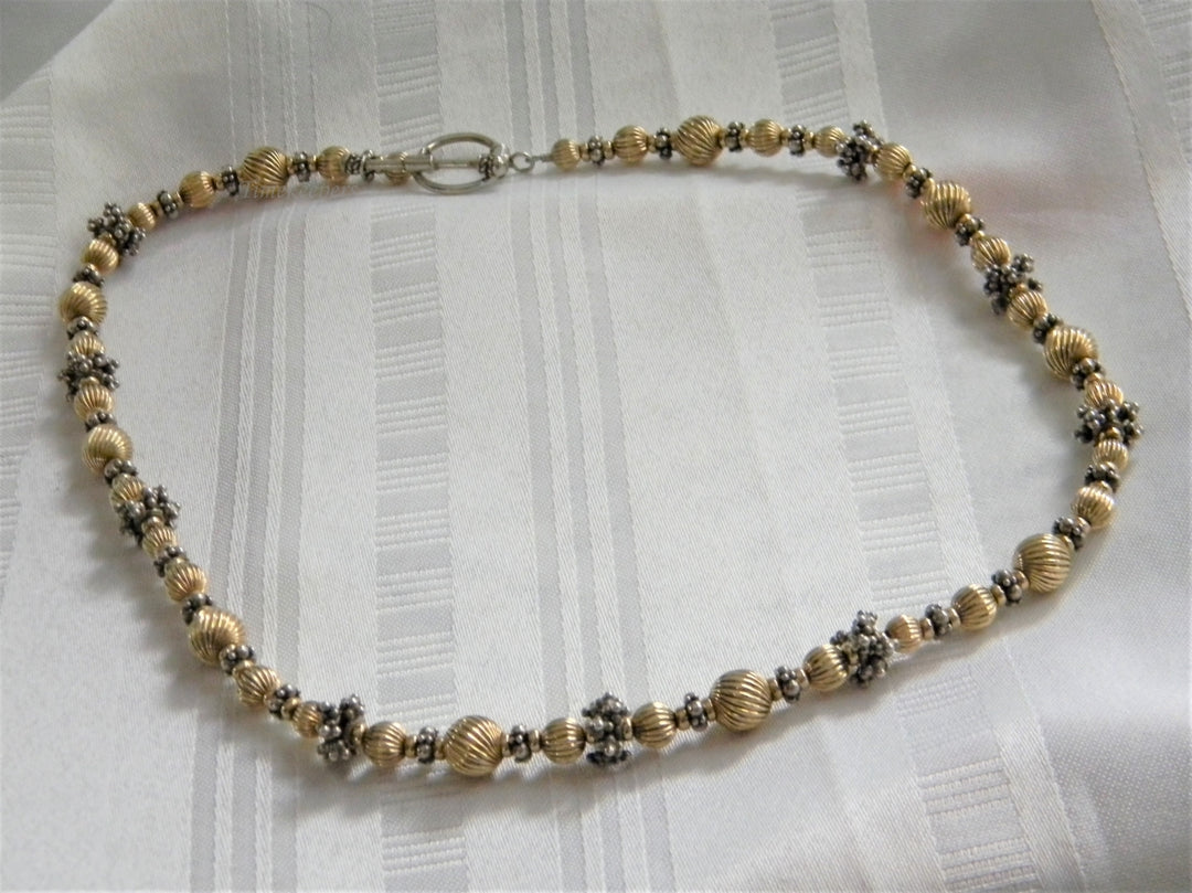 p261 Pretty Gold and Silver tone Beaded Necklace with Toggle Clasp