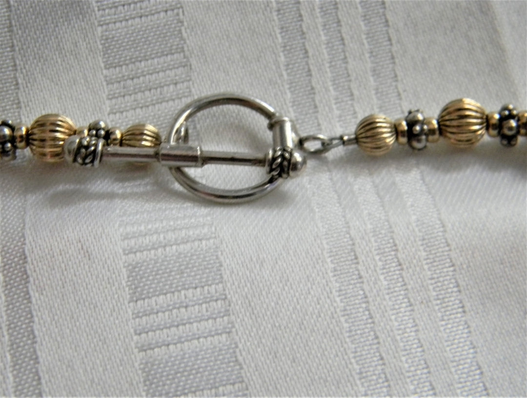 p261 Pretty Gold and Silver tone Beaded Necklace with Toggle Clasp