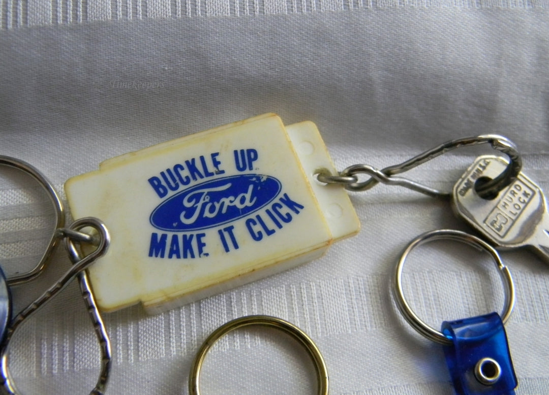 p300 Lot of Eight Ford Items Key chains and Button/Pins