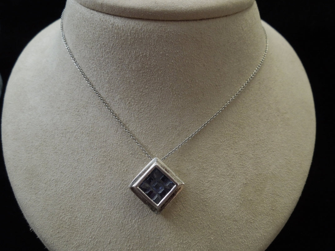 g982 Ladies Pretty Squared Purple Stone Pendant in Sterling Silver