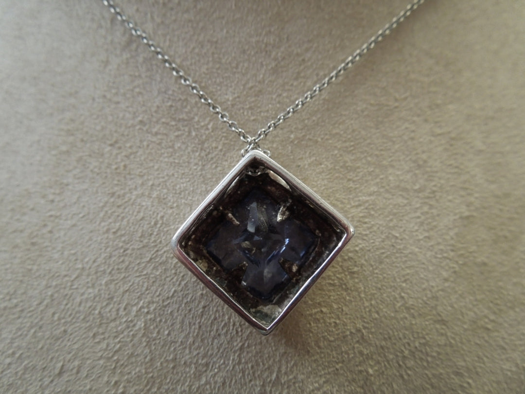 g982 Ladies Pretty Squared Purple Stone Pendant in Sterling Silver