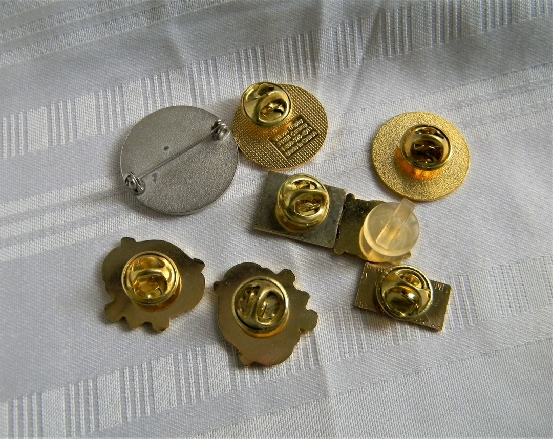 p309 Lot of Eight Lapel Pins, Police and Backstoppers in gold tone