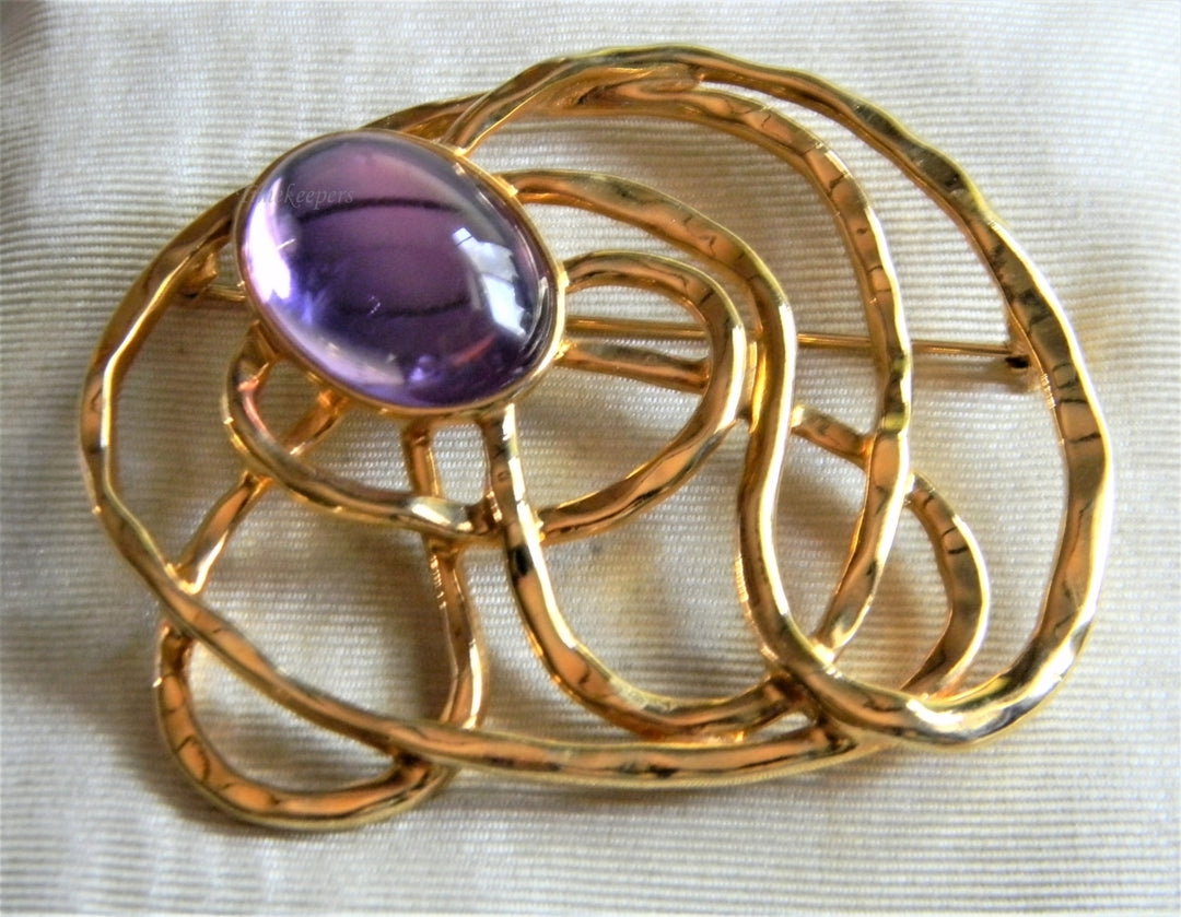 p327 Unique Swirl Design Gold Tone Brooch with Purple Stone by Avon