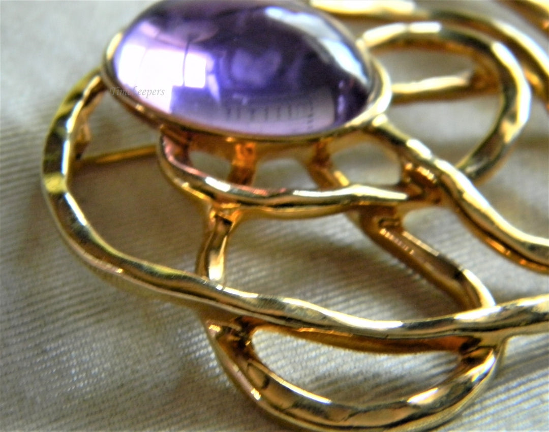 p327 Unique Swirl Design Gold Tone Brooch with Purple Stone by Avon