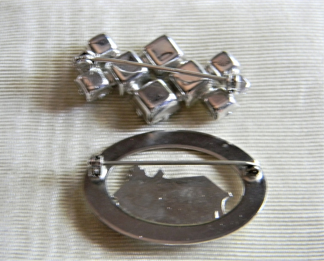 p328 Pair of Vintage Brooches, Rhinestone and Covered Bridge in Silver Tone