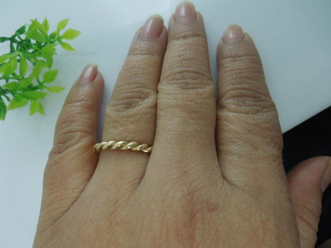 q078 Ladies 14k Yellow Gold Twisted Wedding/Engagement Ring Size-7.25