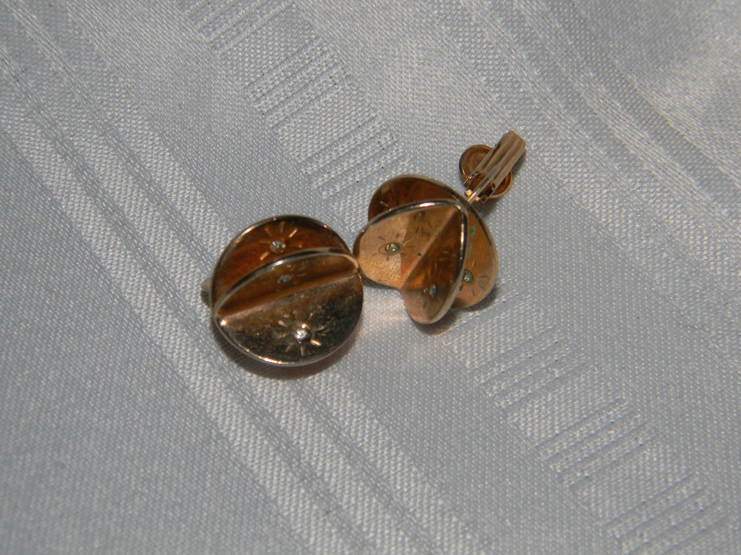 j544 Vintage Unique Rhinestone Castlemark Clip on Earrings in Gold Tone