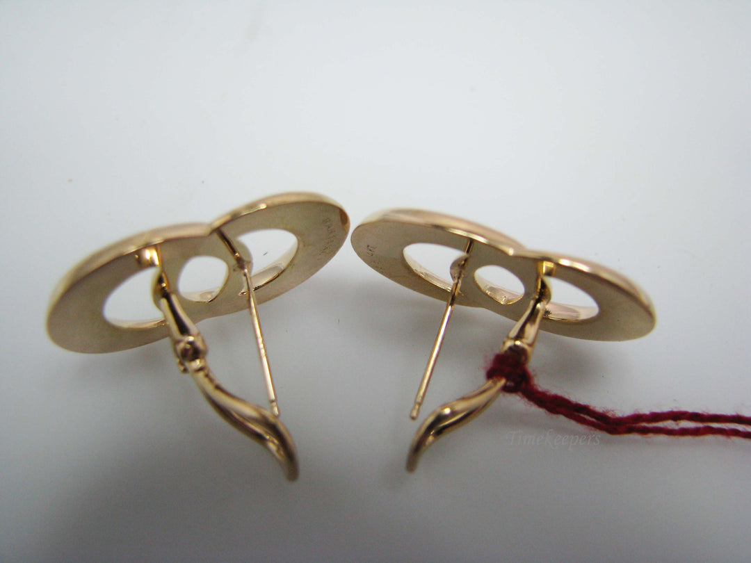 b176 Beautiful Yellow gold circular earrings