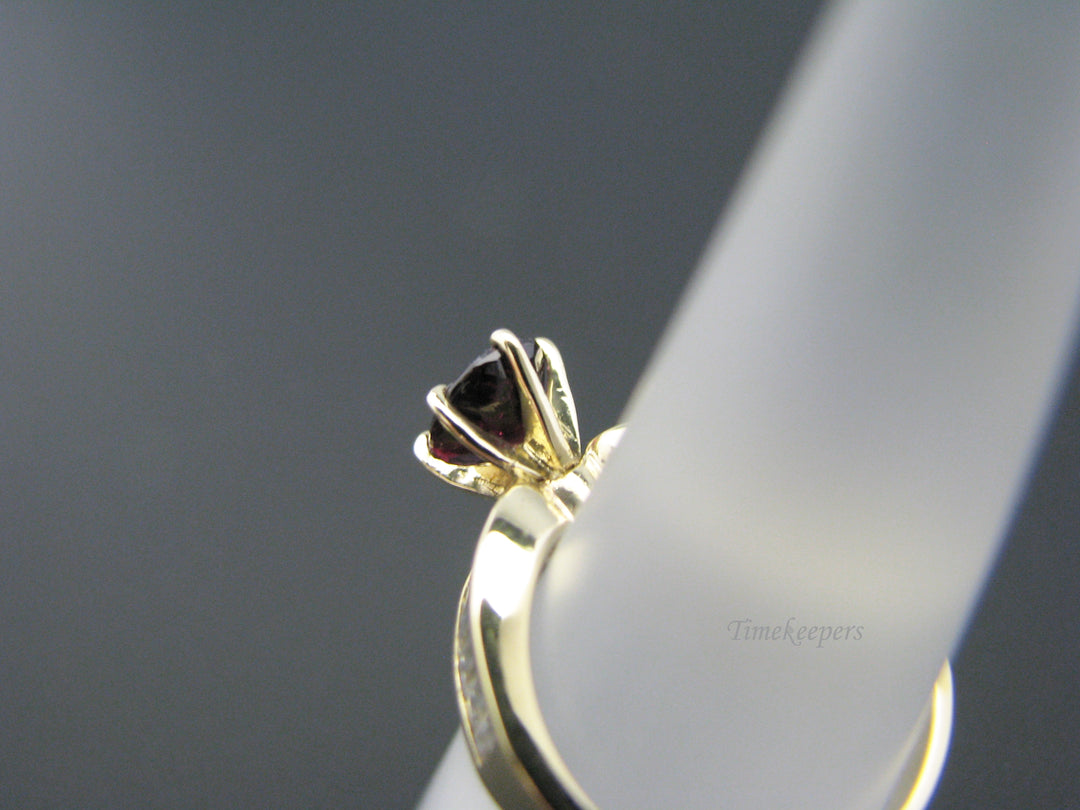 c810 Beautiful Ruby Ring in 14k Yellow Gold with CZ's down both sides