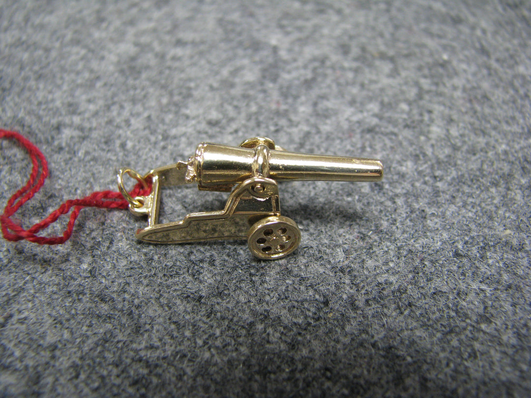 b242 Neat 14kt Cannon pendant