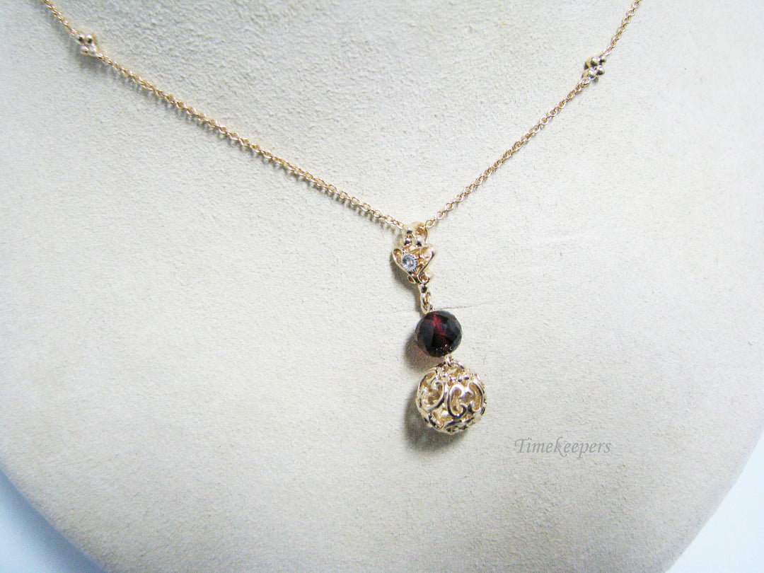 c926 Unique Garnet And Gold Ball Pendant on 17" Fancy Chain all in 14k Gold