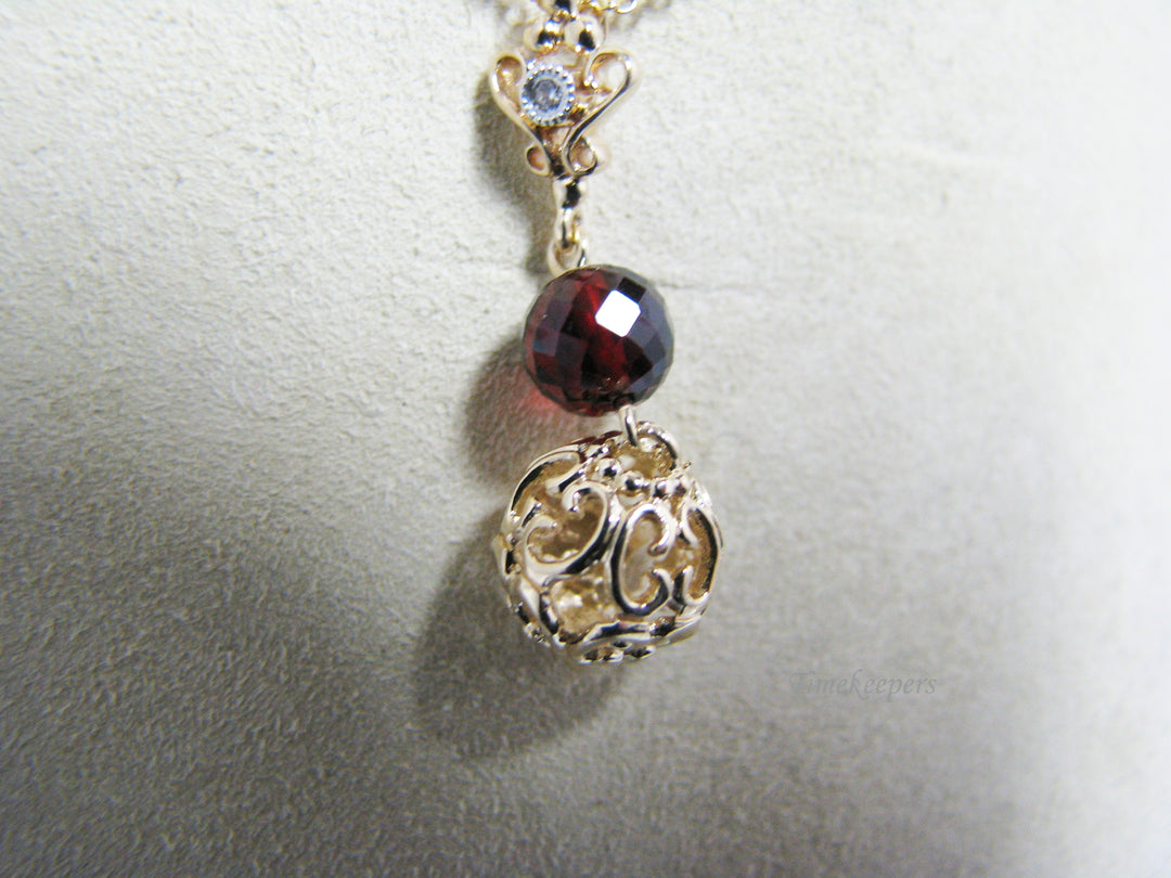 c926 Unique Garnet And Gold Ball Pendant on 17" Fancy Chain all in 14k Gold