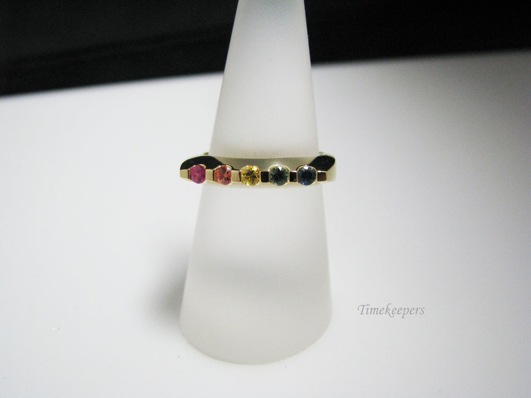 c966 Unique Channel Set Rainbow Sapphires Ring in 18k Yellow Gold